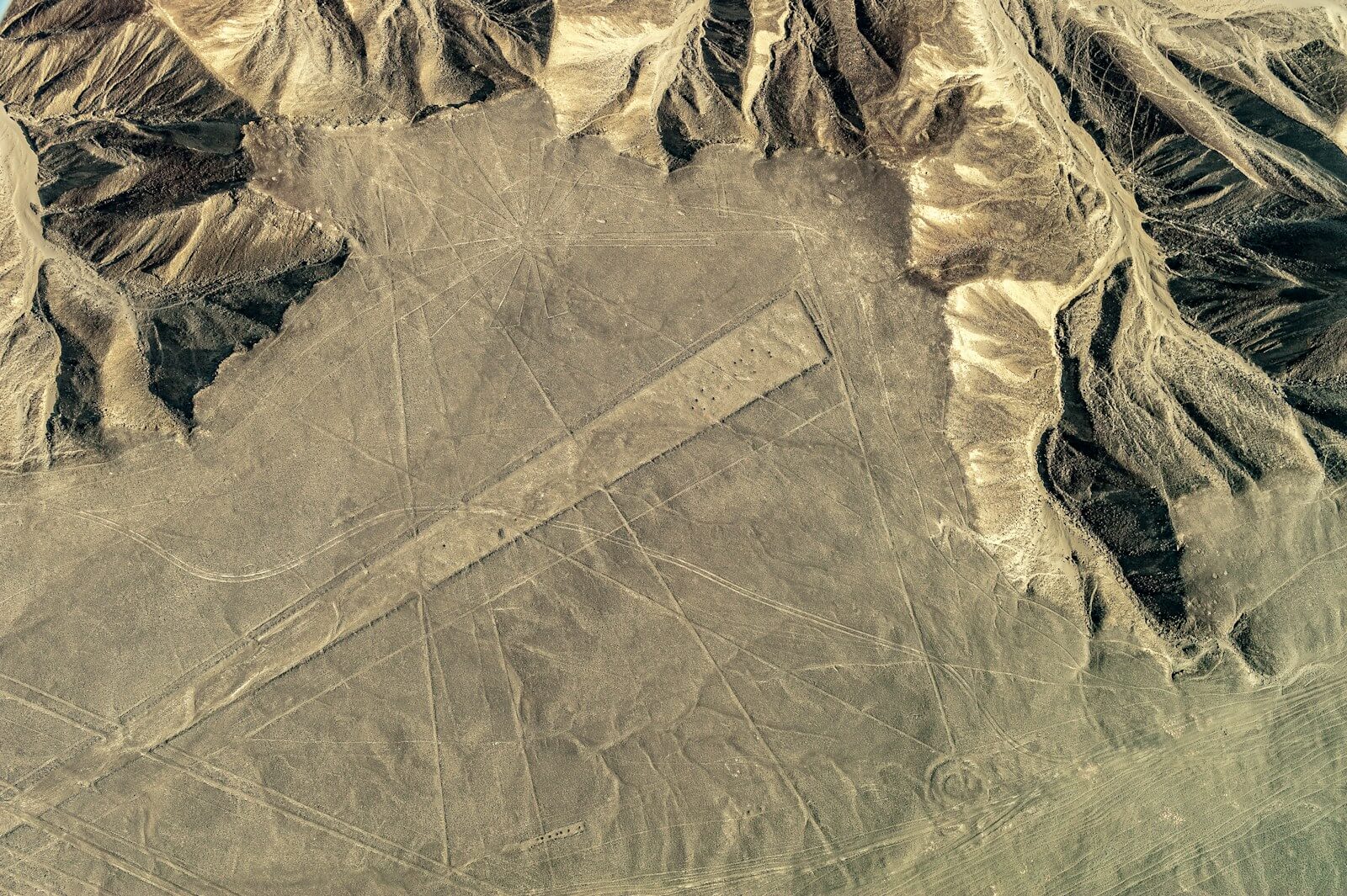 an aerial view of a mountain range in the desert